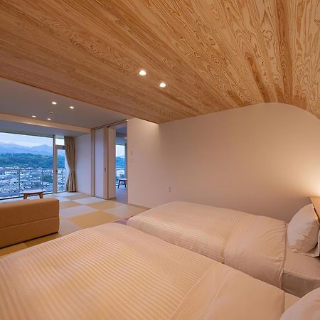 Mikuma Hotel Hita Bagian luar foto