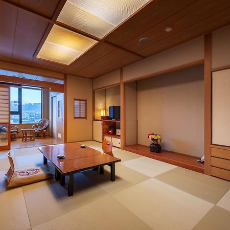 Mikuma Hotel Hita Bagian luar foto