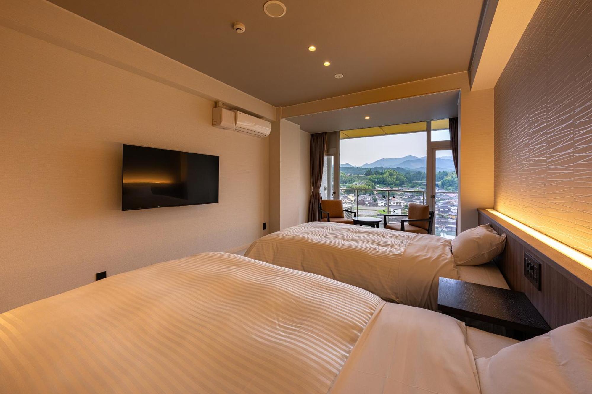 Mikuma Hotel Hita Bagian luar foto