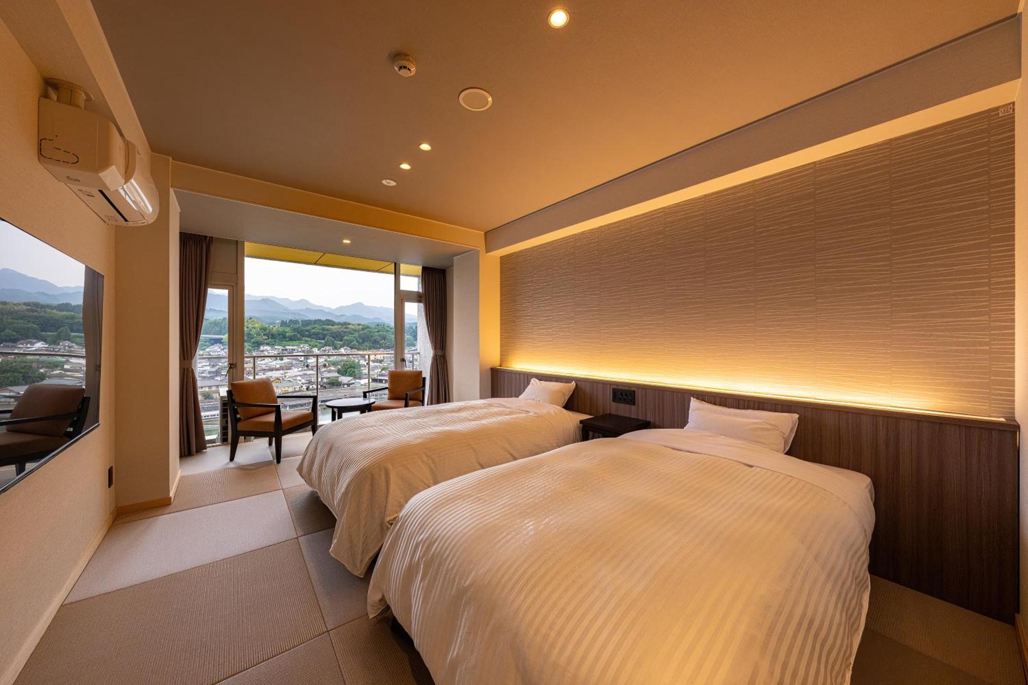 Mikuma Hotel Hita Bagian luar foto