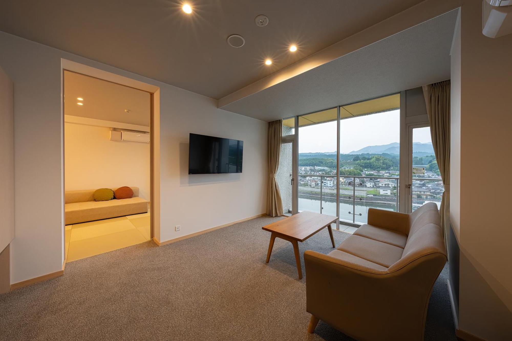 Mikuma Hotel Hita Bagian luar foto