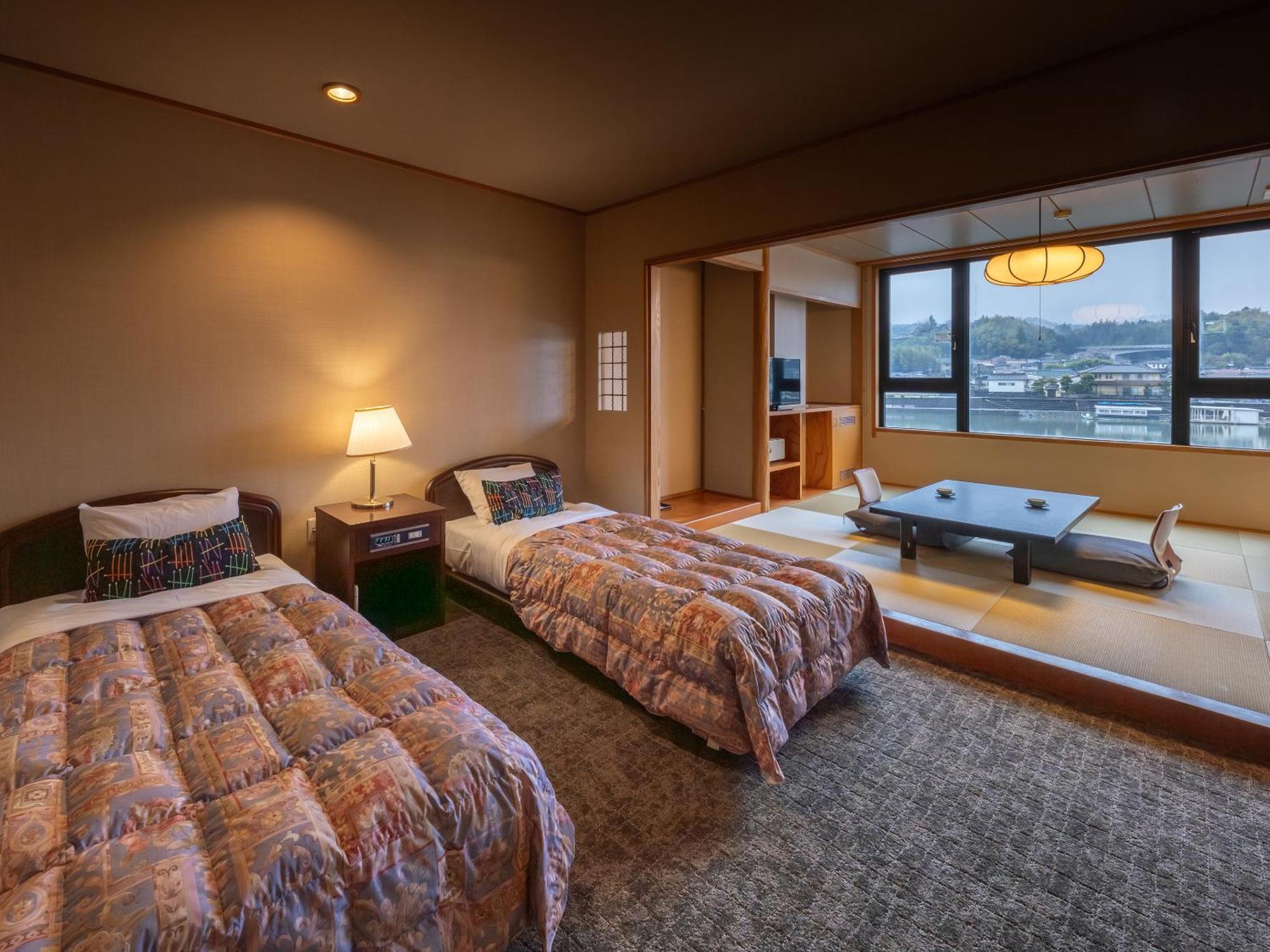 Mikuma Hotel Hita Bagian luar foto