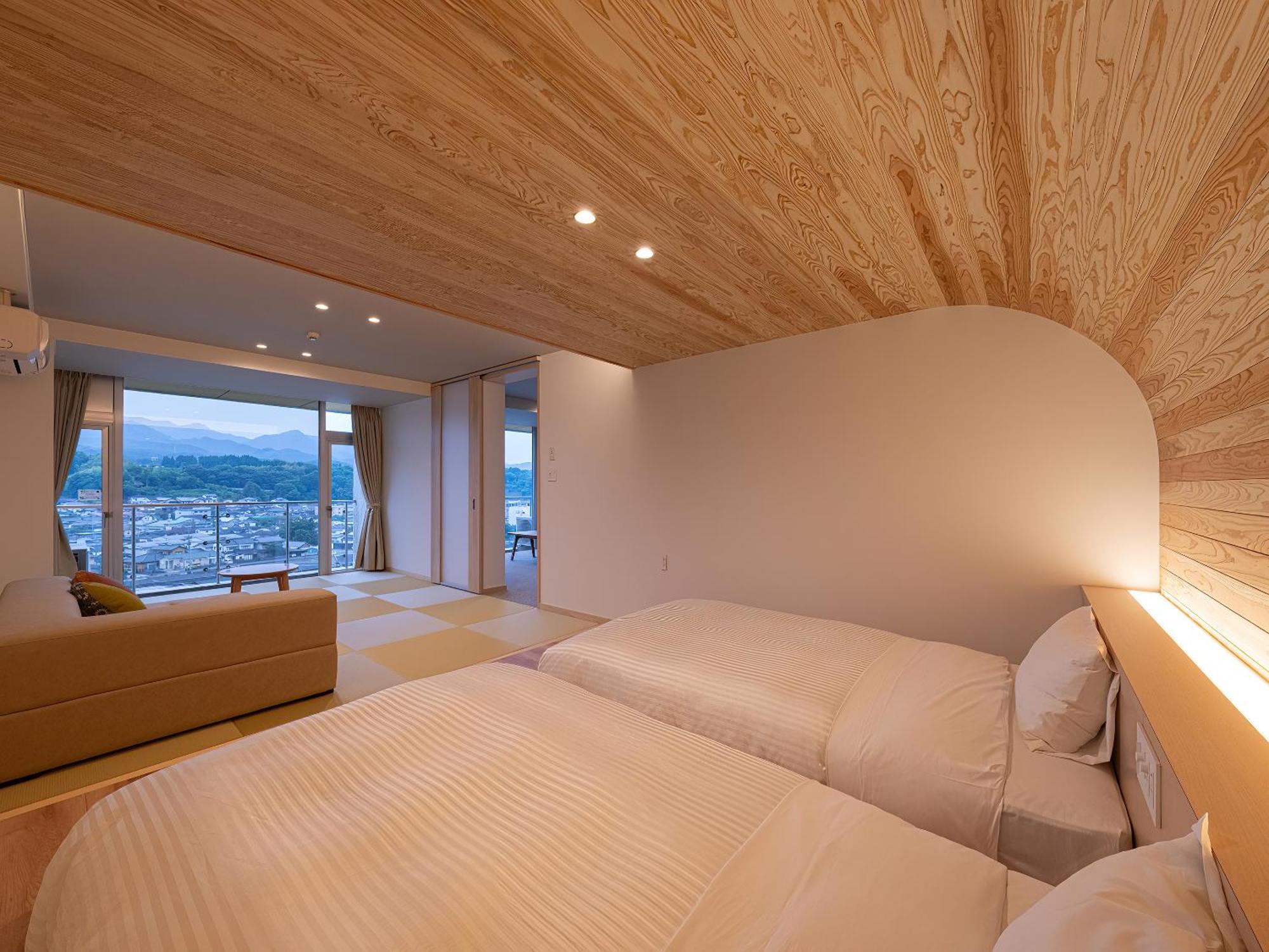Mikuma Hotel Hita Bagian luar foto