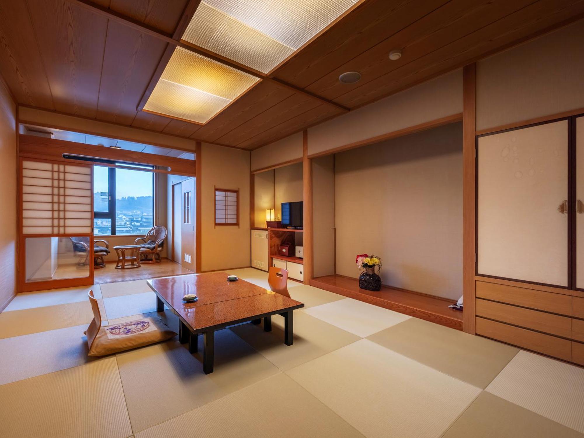 Mikuma Hotel Hita Bagian luar foto