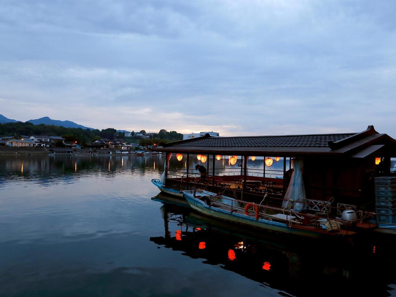 Mikuma Hotel Hita Bagian luar foto