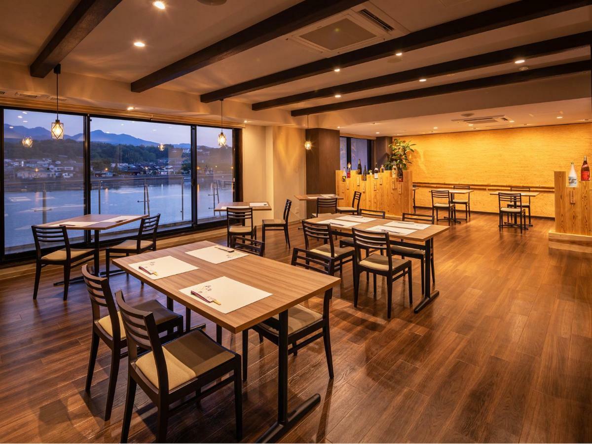 Mikuma Hotel Hita Bagian luar foto