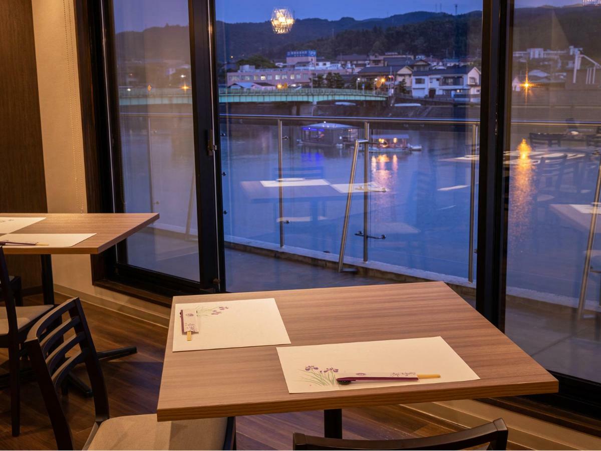 Mikuma Hotel Hita Bagian luar foto